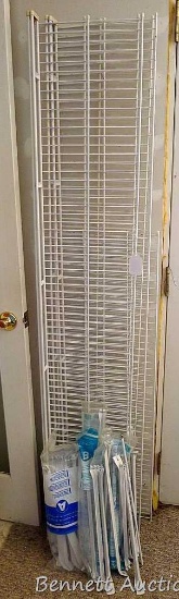 Four wire closet organizer shelves are each 6' x 12" with a hanger section on the front; One shelf