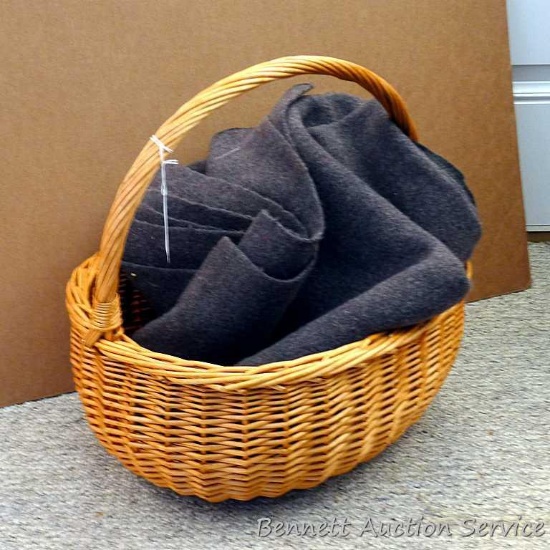Nice wool blanket measures 5-1/2' x 6' and is in overall good condition with a couple of small holes