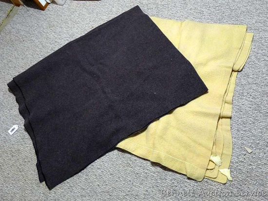Two wool blankets in good condition. Sizes are 66" x 80" and 57" x 70".