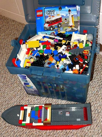 File box filled with lots of Lego pieces for your own creations. Box is 9" x 12" x 11".