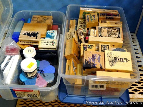 Two plastic totes filled with stamps, ink pads, black and silver embossing powder and more; largest
