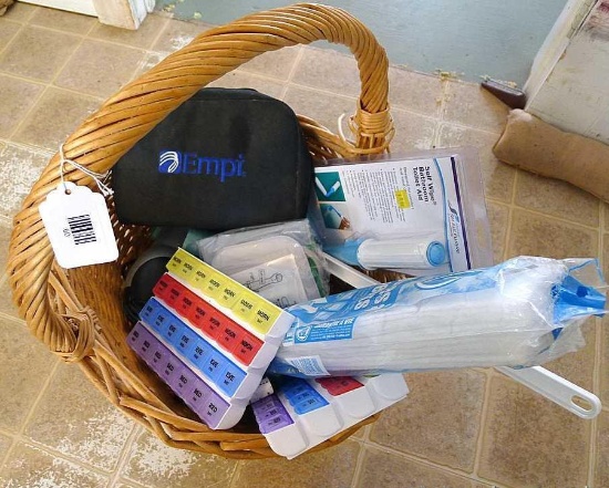 20" wide basket containing a nice TENS unit in case; Conair Ionic hair dryer; pill sorter boxes;