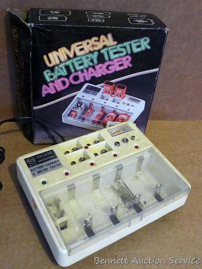Universal Battery Tester and Charger; measures 5-1/2" x 7" x 2". Lights up.