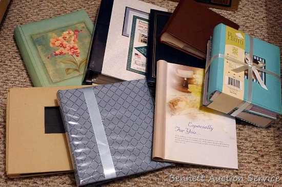 Photo albums up to 300 pocket, one has some neat pictures of old vehicles. Nice variety of albums.
