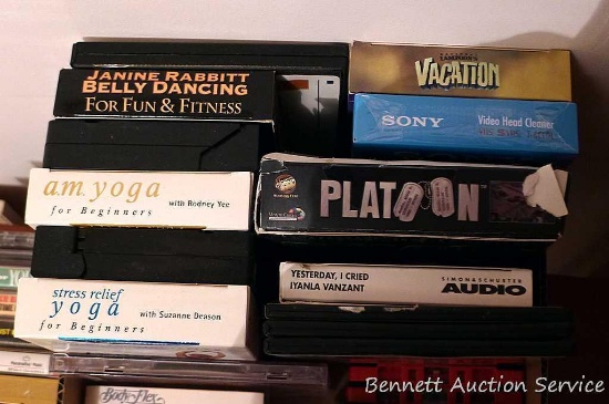 Fitness VHS tapes, plus some cassette tapes - some blank and new, some Christmas music, etc.;
