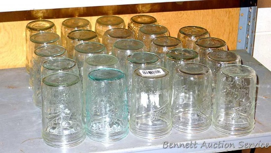 Twenty four Ball wide mouth pint canning jars.