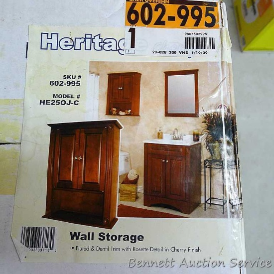 Wall mountable storage unit in a Cherry finish, measures 20-1/2" wide x 25-1/4" high x 7-1/2" deep.