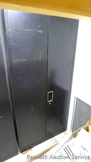 Large metal storage cabinet comes with four adjustable shelves. Unit is lockable, very sturdy and