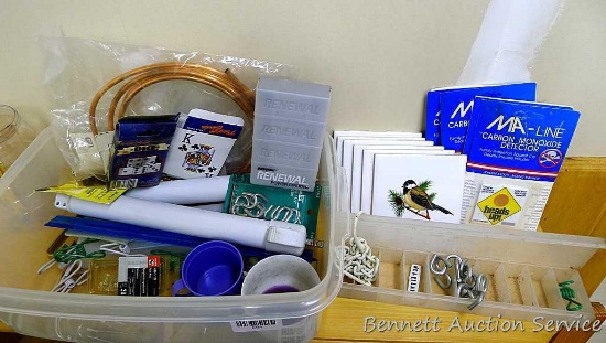 Household items including screen door hardware, copper tubing, carbon dioxide detectors, hooks,
