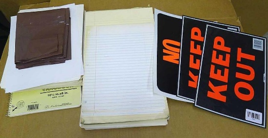 3" tall stack of paper - great for kids to draw on, plus a few notebooks and two Keep Out signs,