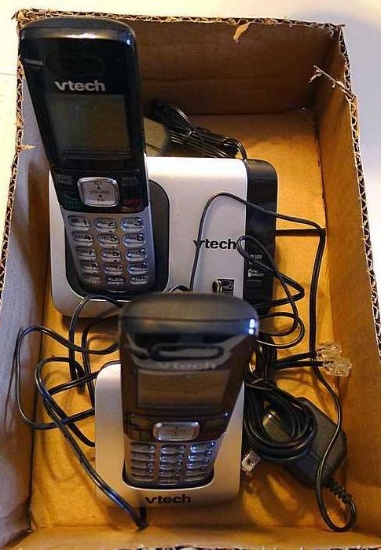 V-Tech cordless phone set with base unit.