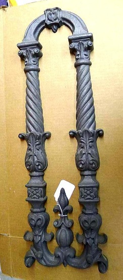 Decorative cast iron piece measures 28" x 9" at widest.