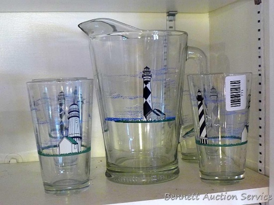 Lighthouse themed iced tea set includes pitcher and four 6" tall glasses.