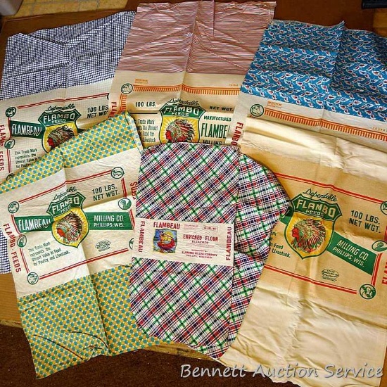 Six vintage feed sacks all from Flambeau Milling Company, Phillips, Wis and Flam-bo Feeds. Brightly