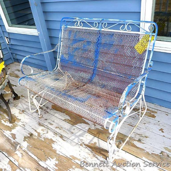 Cute gliding patio rocker matches the chairs in lot 793. Measures 41" x 27" x 34" high and would