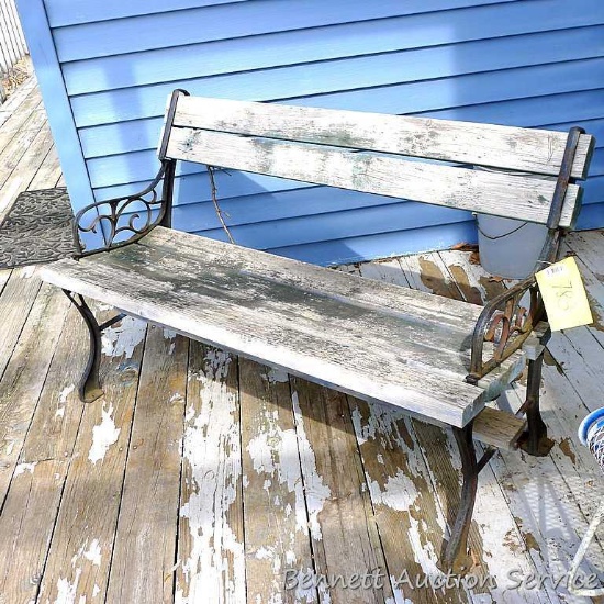 Nice bench has cast iron ends and is still pretty sturdy. Measures approx 4' x 2' x 29" high.