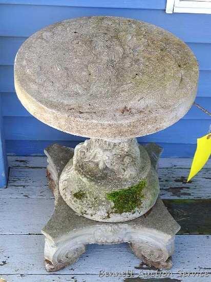 Concrete cherub lawn decoration table is three pieces for easier moving. Top is about 17" wide,