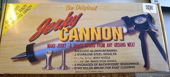 Jerky Cannon has a 15" tube. Instructions and cleaning brush included.