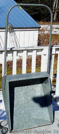 Galvanized snow scoop is about 23" x 58".