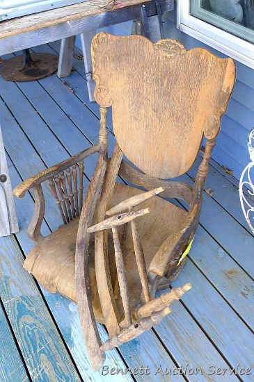 Vintage rocking chair project could be put back together or sturdied up and made into a swing. Seat