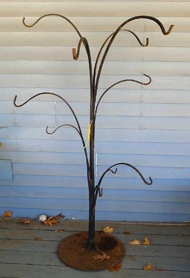 Nice shepherd hook style tree would hold lots of bird feeders or flower pots! Stands about 62" high