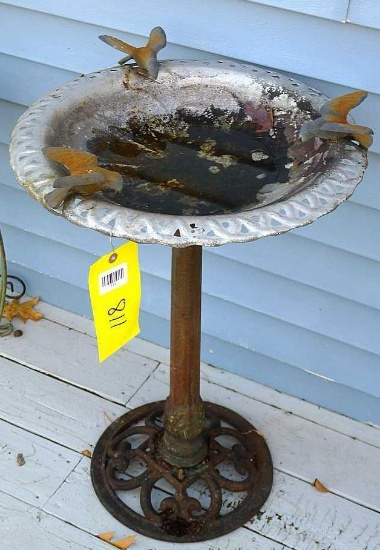 Nice metal bird bath is about 20" wide and 30" high overall.