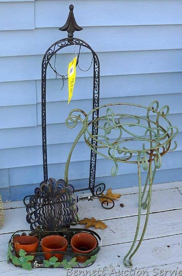 Plant stands, wind chime stand, spinning yard ornament, more. Wind chime stand is about 34" high.