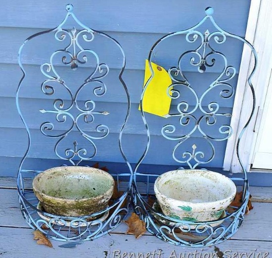 Pair of hangable planter baskets with pots; baskets are approx 11" x 8" x 23" high. One pot has some