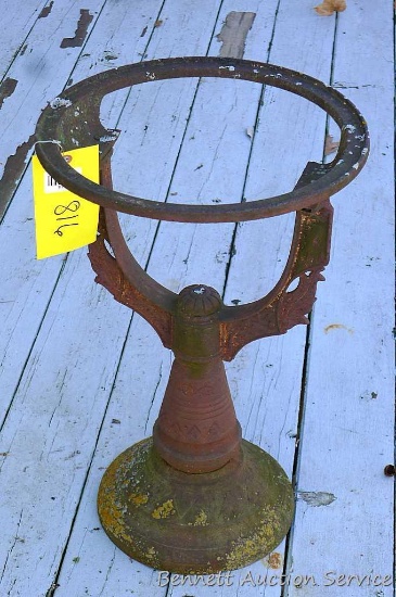 Nice cast iron base for a bird bath is about 23" high and 15" wide.