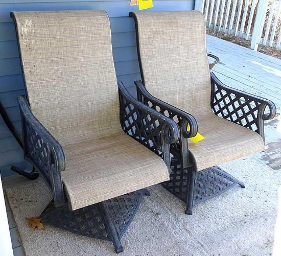 Two nice swiveling patio chairs are about 25" x 24" x 41" high. Look to be in good condition.