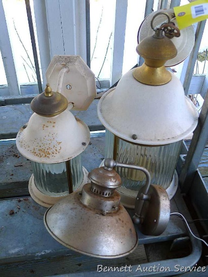 Three outdoor light fixtures, largest is 21" high. Small amount of rust noted, could be repainted to