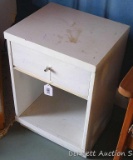 Wooden storage cabinet is 15