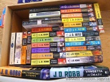 Box of books by author Nora Roberts, Nora Roberts writing as J.D. Robb and lots of J.D. Robb.