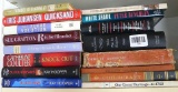 Stack of mostly hardcover books including The Sugar Solution, Knock Out, Blood Sins, Blood Dreams, A