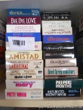 Stack of VHS movies including Fried Green Tomatoes, Return to Snowy River, Nine Months, Pretty