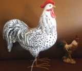 Two chicken figurines. Largest is 8