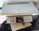 HP Photosmart 3310 All-In-One printer/fax/scanner/copier. Turns on. Gives 