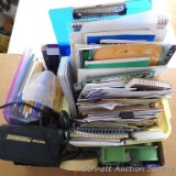 Office supplies including hanging file folders; white card stock; 9x12 clasp envelopes; Boston