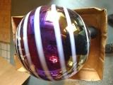 Decorative ball used for a lawn ornament is 11