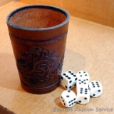 Leather dice cup with six dice. Cup stands nearly 3-1/2