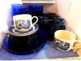 Beautiful blue dinnerware set includes three dinner plates, six salad or dessert plates, eleven