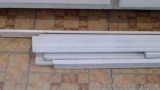 Primer white wooden trim up to approx. 14' long. 2-1/2