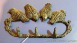 Adorable cast iron wall hooks with birds; measures 10