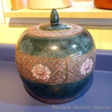 Decorative canister with lid; measures 8-1/2