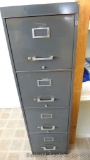 Four drawer metal file cabinet is 15