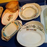 Collection of different sized plates and small platters and bowl; largest bowl with handles measures