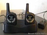 Pair of Cobra microTalk walkie-talkies. Both power up, both charging stations work, one battery pack