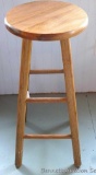 Wooden swivel stool is 29