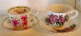 Two English bone china tea cups with saucers. All in good condition.