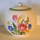 Vintage round or ball canister has some light crazing, but no cracks or chips. Measures approx. 8